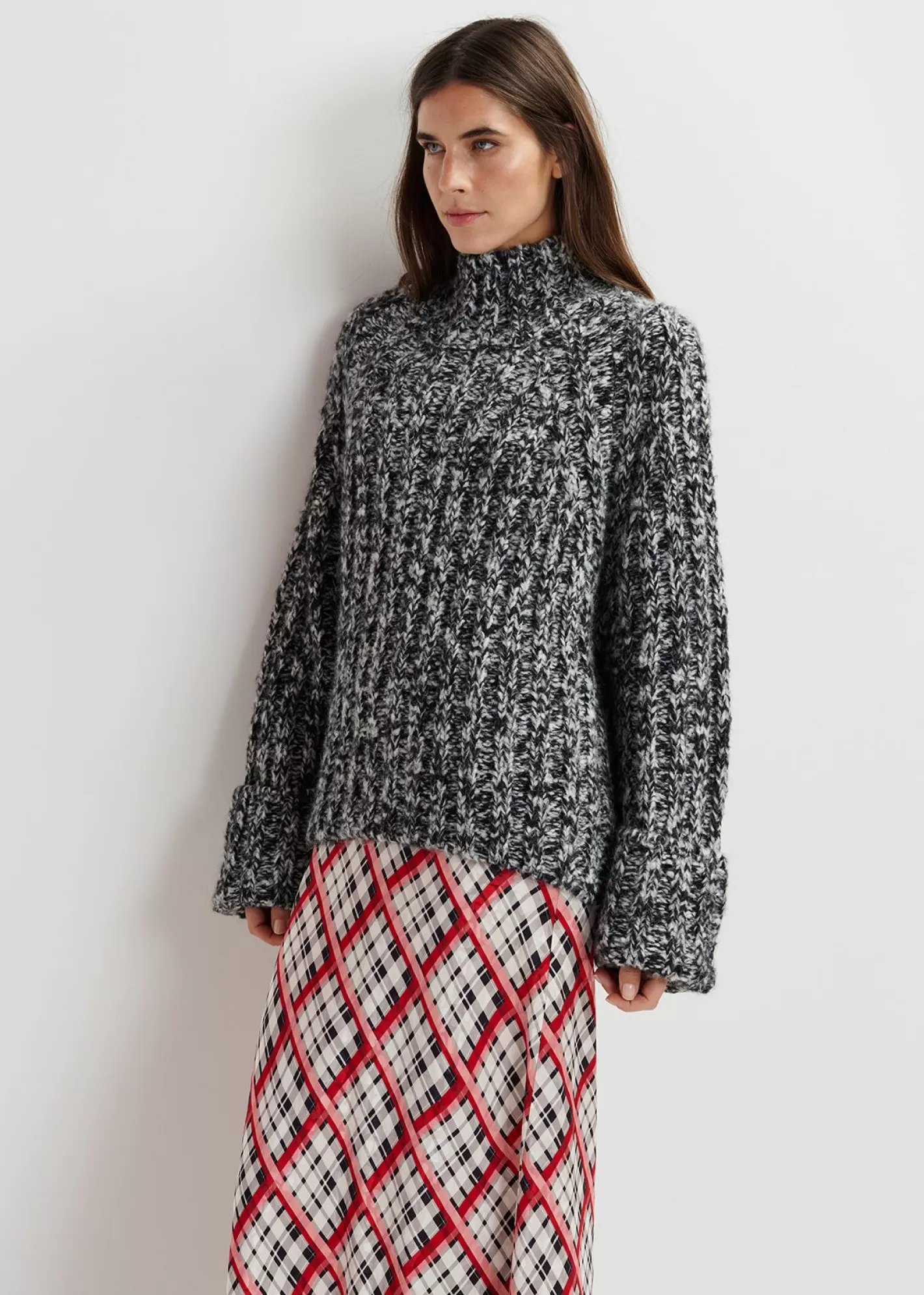 New Black and ecru mélange knit sweater with turtleneck Fall 2024 Collection | Sweaters & Cardigans