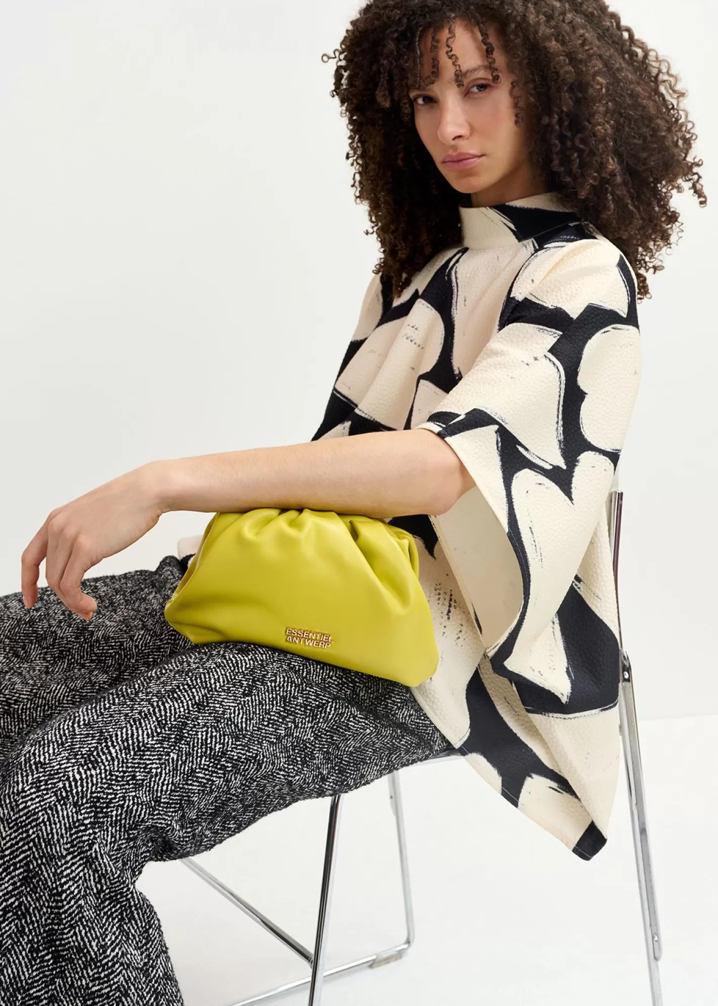 Hot Black and off-white oversized top with stand-up collar Fall 2024 Collection | Prints