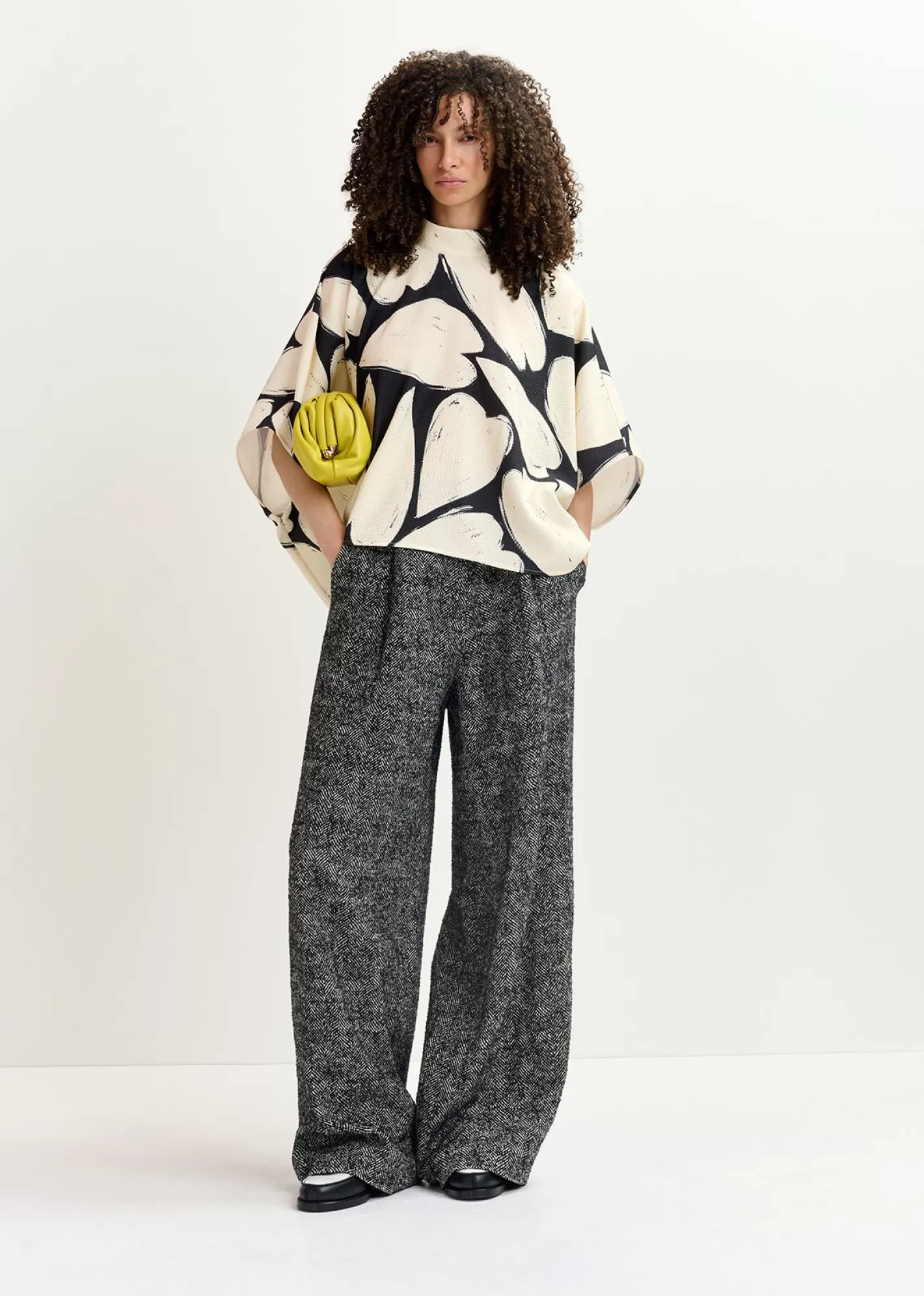 Hot Black and off-white oversized top with stand-up collar Fall 2024 Collection | Prints