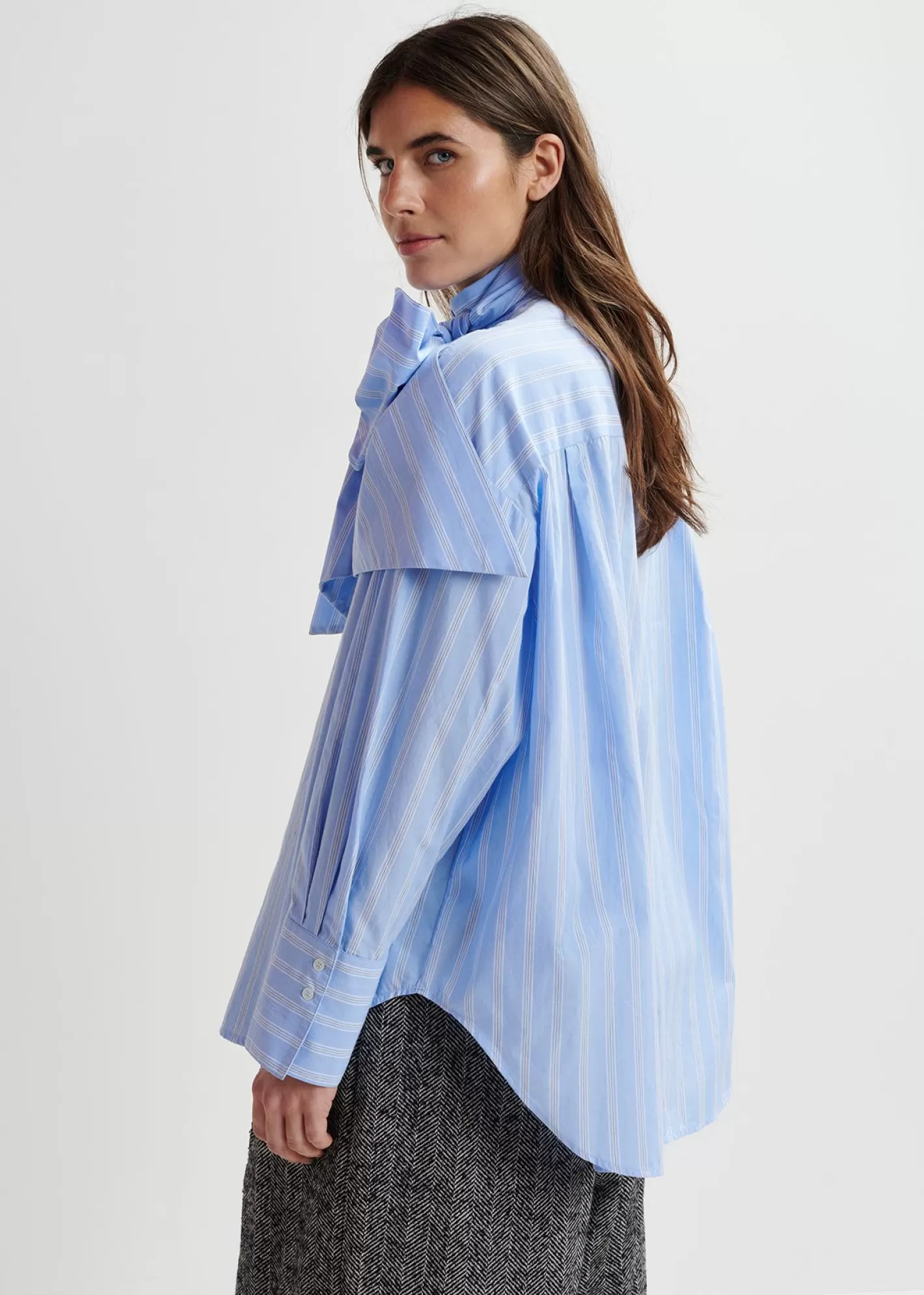 Cheap Blue, white and black striped cotton shirt with pussy bow Fall 2024 Collection | Tops & Blouses