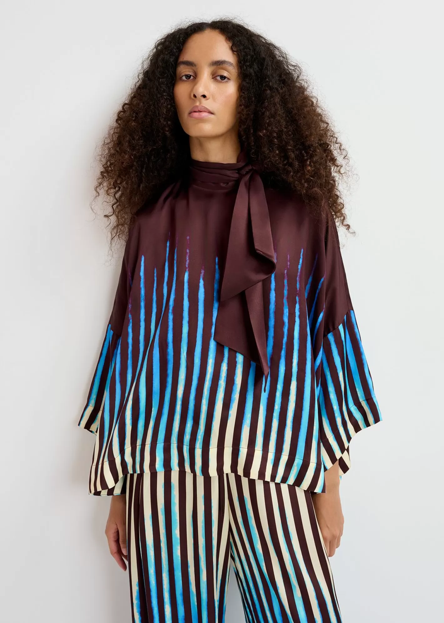 Clearance Brown, blue and ecru oversized top with pussy bow Fall 2024 Collection | Partywear