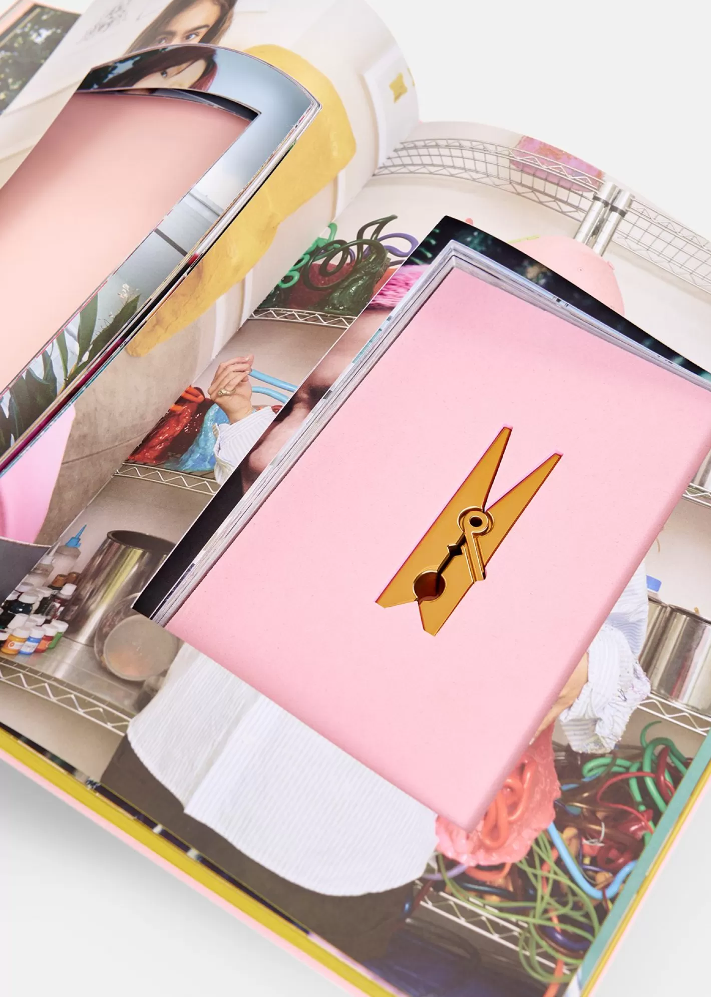 Hot Pink and yellow 25 years coffee table book with exclusive paperweight 25 Years Limited Edition Capsule