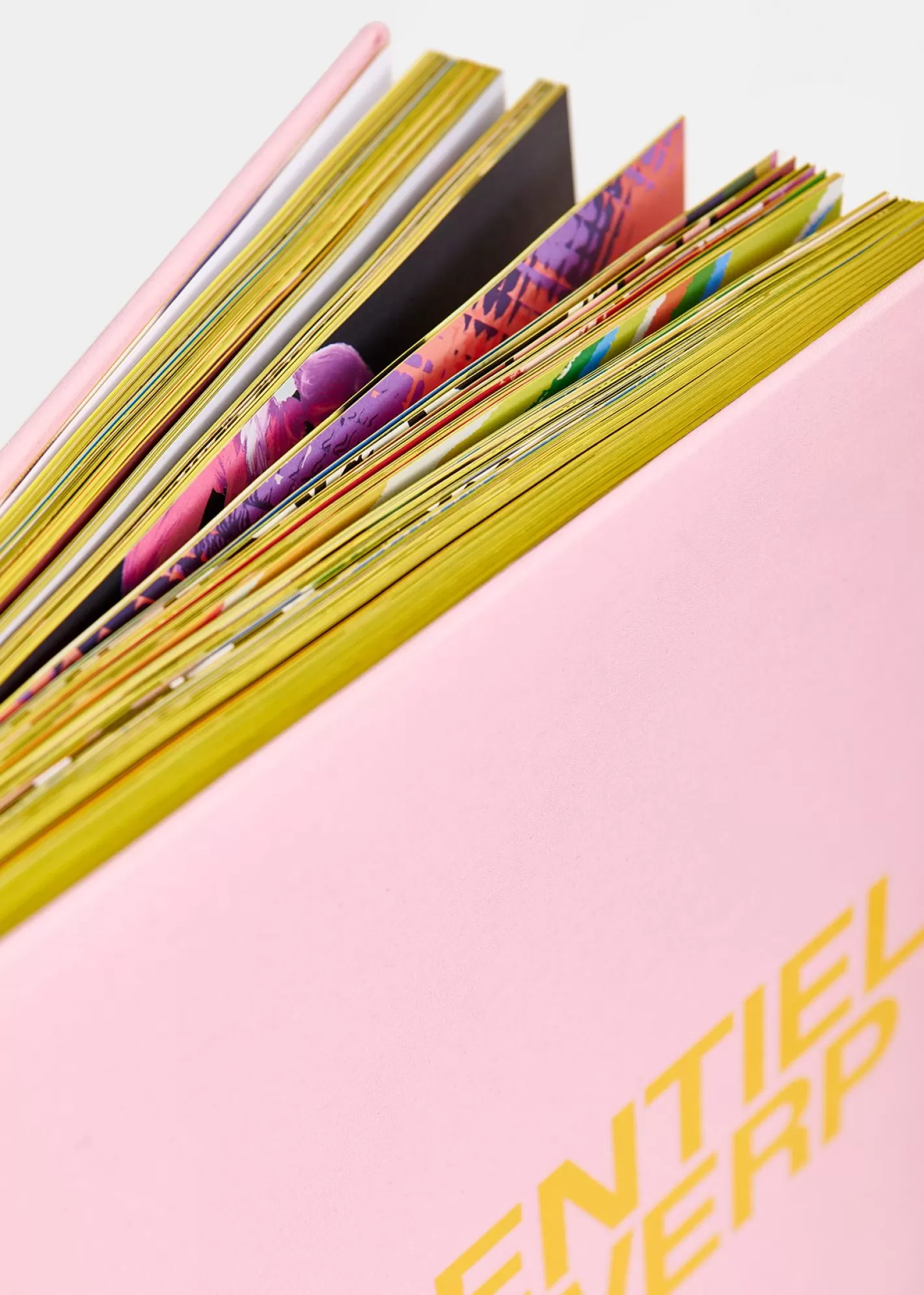 Hot Pink and yellow 25 years coffee table book with exclusive paperweight 25 Years Limited Edition Capsule
